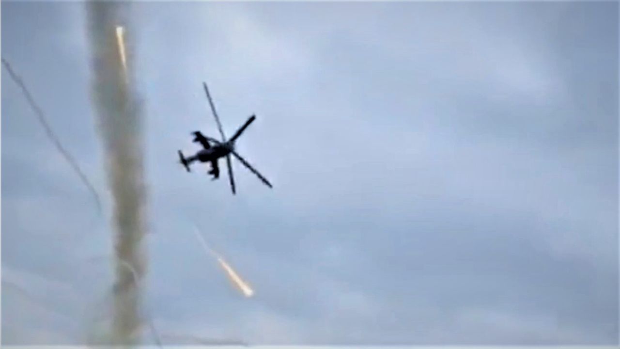 Russian Mi-24 helicopter chases unidentified drone over densely populated area