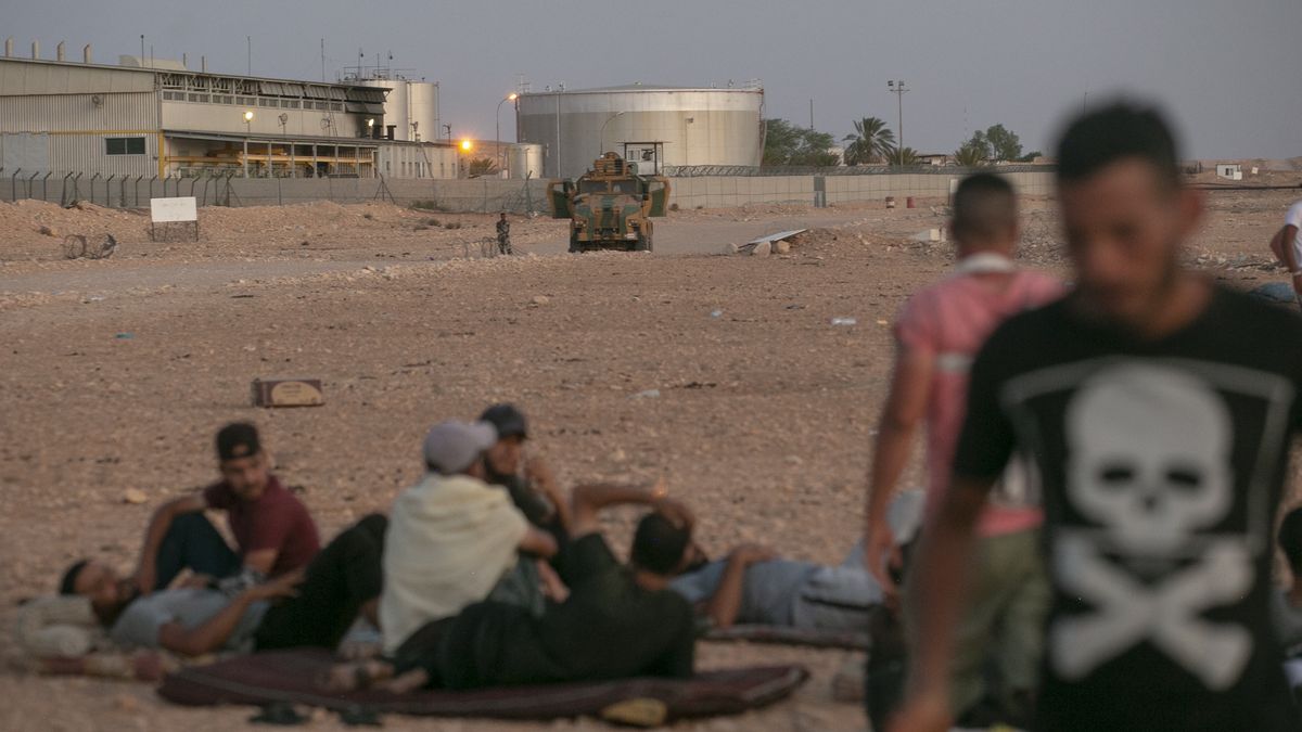 TATAOUINE, TUNISIA - JULY 13: Tunisian army takes security measurements as protesters, setting up tents in front of an oil facility, where oil wells are intensely located, hold a sitting action over the death of a young man, killed earlier this week in a town close to the border with Libya and against unemployment in Kamour, the southern governorate, Tataouine, Tunisia on July 13, 2020. (Photo by Yassine Gaidi/Anadolu Agency via Getty Images)