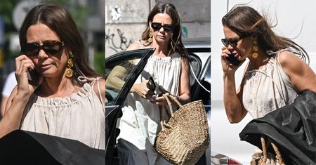 Odziana w zwiewną sukienkę Kinga Rusin załatwia sprawunki na mieście, prowadząc przez telefon żywą rozmowę. Stylowa? (ZDJĘCIA)