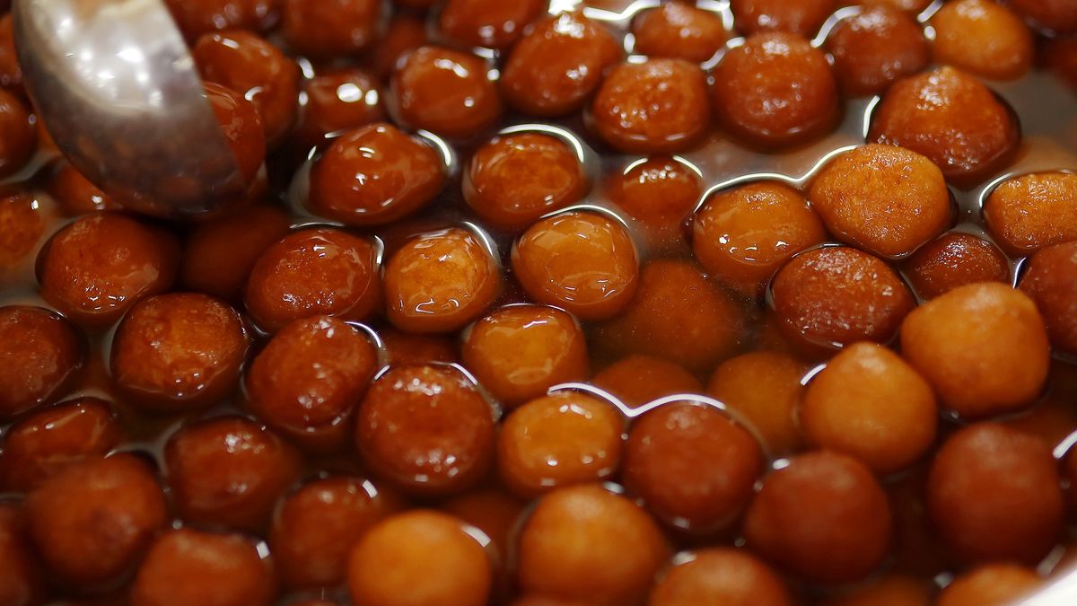 Delicious Gulab jamun served indian wedding catering style .Delicious Gulab jamun served indian wedding catering style .Subin Sailendran Photographycalorie, closeup, colorful, cool, cream, crispy, cuisine, delicious, diet, diet concept, dinner table, dish, diwali food, diwali recipe, dried milk, event food, fat, fresh, healthy, healthy food, ice-cream, isolated, milk solid, mixed fruit salad, natural, nutrition, party, serve, sliced, sweet, sweets, tasty, vitamins, wedding food, white, yummy