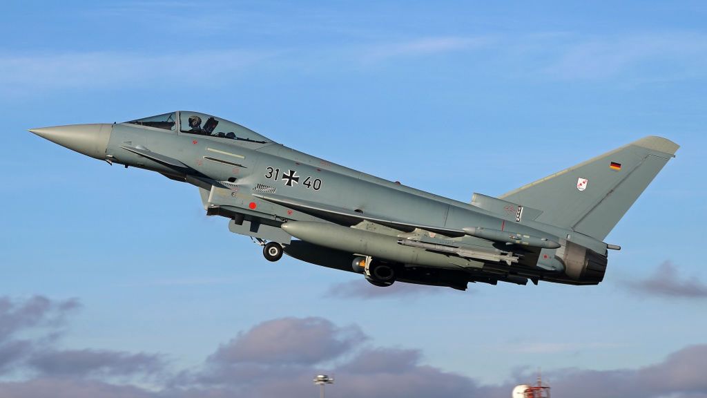 Tactical Leadership Programme Albacete
The Eurofighter EF-2000 Typhoon of the Luftwaffe (German Air Force) takes off from Los Llanos military air base during the Tactical Leadership Programme in Albacete, Spain, on November 21, 2024. (Photo by Joan Valls/Urbanandsport /NurPhoto via Getty Images)
NurPhoto
aerial maneuvers, aircraft photography, german air force, aircraft, albacete, military aircraft, leadership training, los llanos miitary air base, pilot training, los llanos, luftwaffe, european fighter, training program, defense, ef-2000, otan, aeronautics, 31-51, fighter jet, takeoff, november 21, joan valls, tlp, military aviation., nurphoto, military air base, aviation, eurofighter, fighter aircraft, urbanandsport, tactical leadership programme, albacete airport los llanos, air base, international cooperation, eurofighter typhoon ef2000