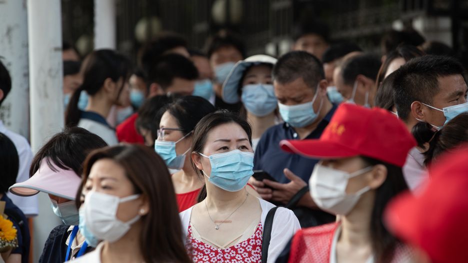 WUHAN, CHINA - JUNE 7, 2022 - Candidates walk into an examination room at Wuhan No.2 Middle School in Wuhan, capital of Central China's Hubei Province, June 7, 2022. China's college entrance exam begins today. (Photo credit should read CFOTO/Future Publishing via Getty Images)