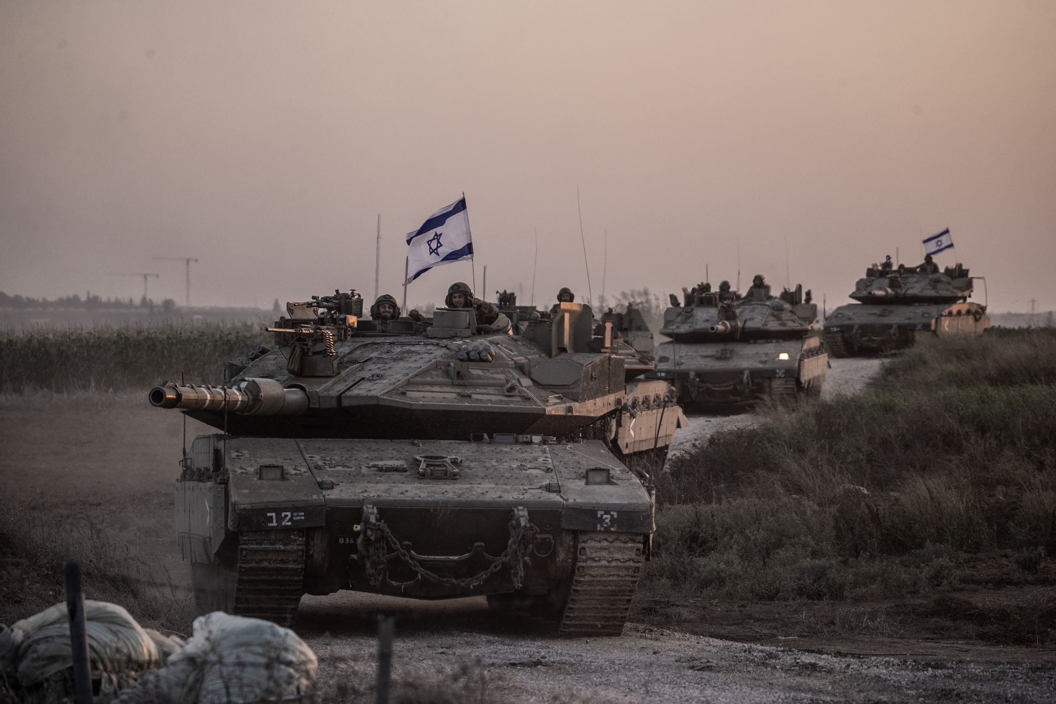 Israeli forces increase measures near the Gaza border
ISRAEL - OCTOBER 12: Israeli tanks move near Gaza border as Israeli army deploys military vehicles around the Gaza Strip, Israel on October 12, 2023. (Photo by Mostafa Alkharouf/Anadolu via Getty Images)
Anadolu Agency
israeli soldier, border, gaza, gaza border, heavy armed vehicles, israel flag, israeli, military vehicles, tank, tanks