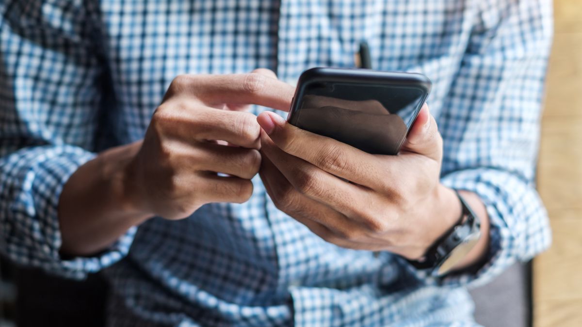 Young casual Businessman holding and using smartphone for sms messages, hipster man typing touchscreen cell phone in the cafe. business, lifestyle, technology and Social media network concept
app, application, business, businessman, cafe, call, casual, cell, cellphone, cellular, communication, connection, device, digital, display, electronic, gadget, hand, hipster, holding, home, internet, lifestyle, looking, male, man, media, message, mobile, modern, network, online, person, phone, professional, screen, smart, smartphone, sms, social, technology, telephone, touch, touchscreen, typing, using, wireless, work, worker, young