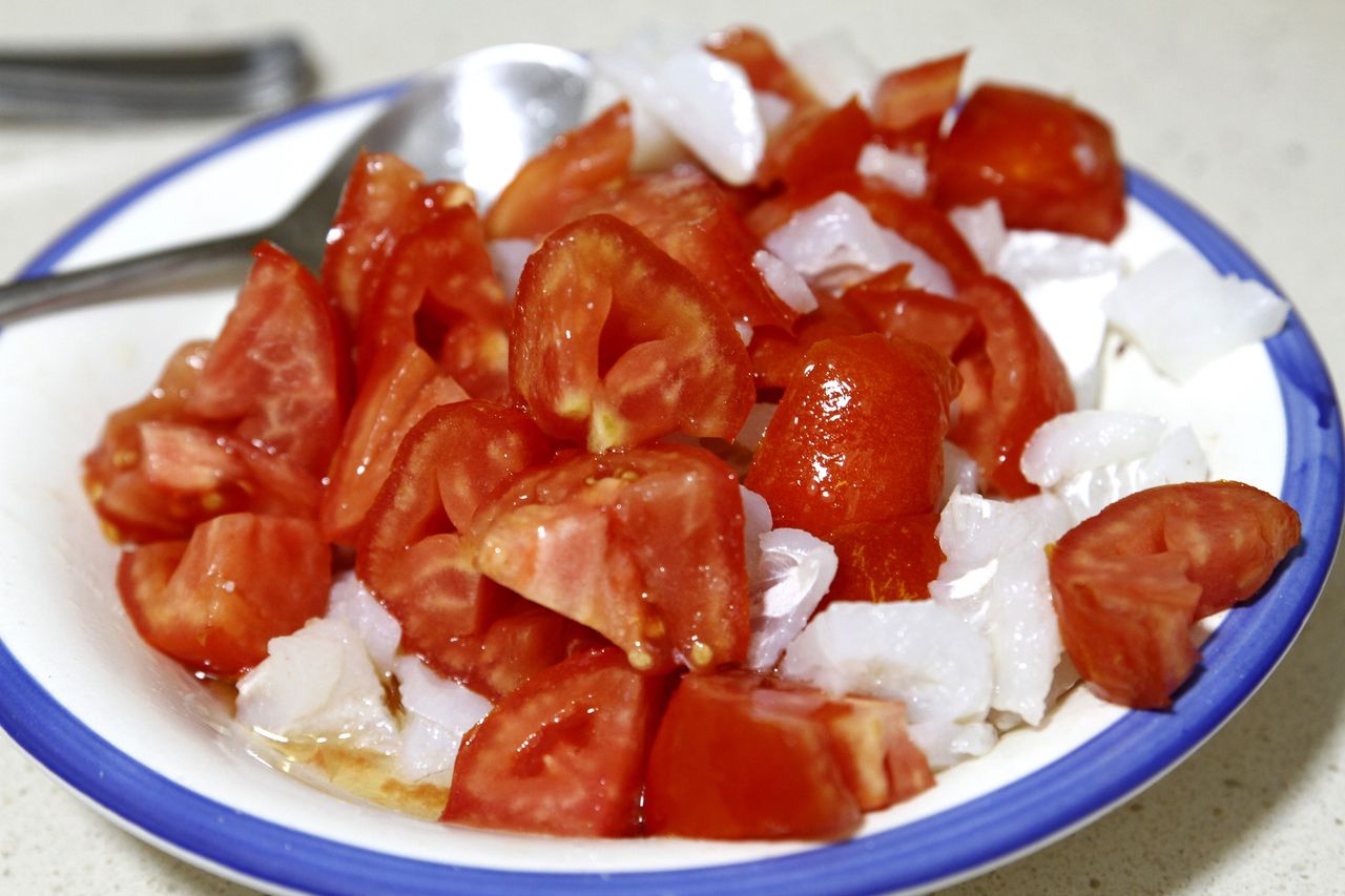 Simple steps to a lighter tomato and onion salad