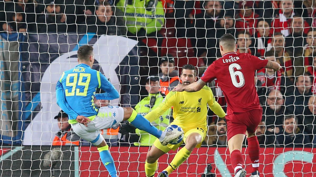 Getty Images / Na zdjęciu: Arkadiusz Milik (L) i Alisson (P)