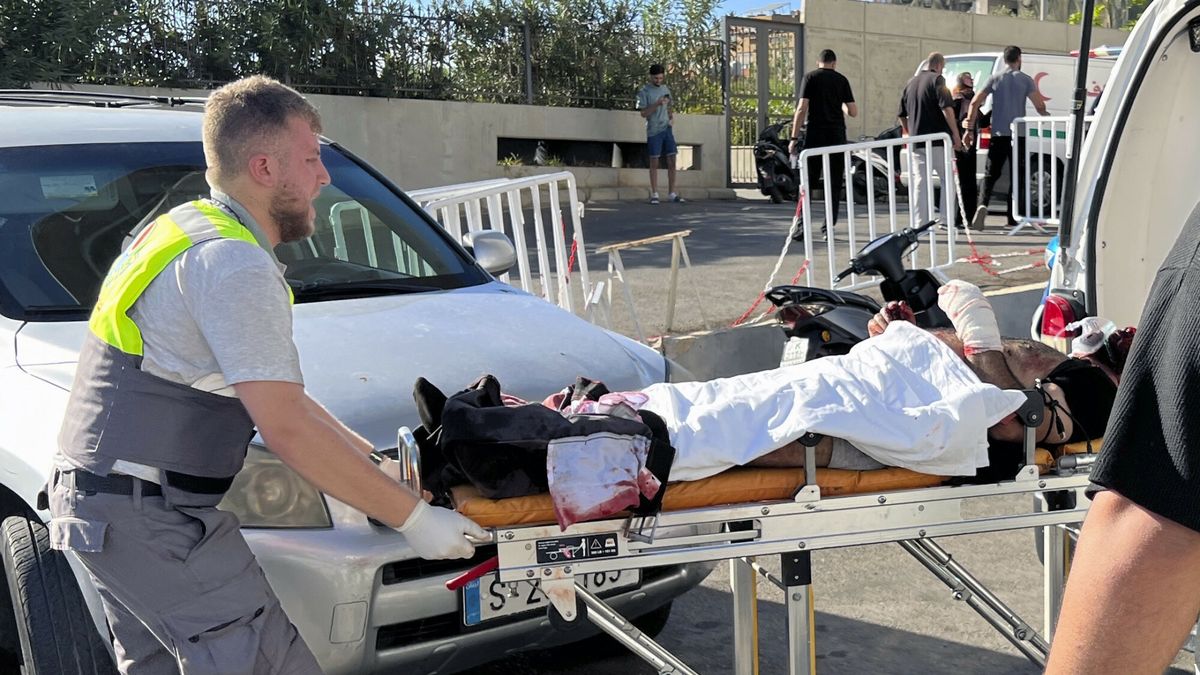 Temporary
A Civil Defense first-responder carries a wounded man whose handheld pager exploded at al-Zahraa hospital in Beirut, Lebanon, Tuesday, Sept. 17, 2024. (AP Photo/Hussein Malla)
Hussein Malla