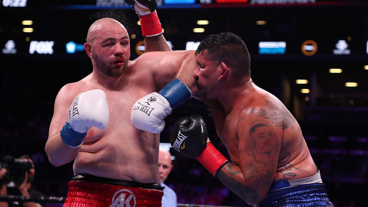 NEW YORK, NEW YORK - AUGUST 03:  Adam Kownacki hits Chris Arreola with an elbow during their heavyweight fight at Barclays Center on August 03, 2019 in New York City. (Photo by Al Bello/Getty Images)