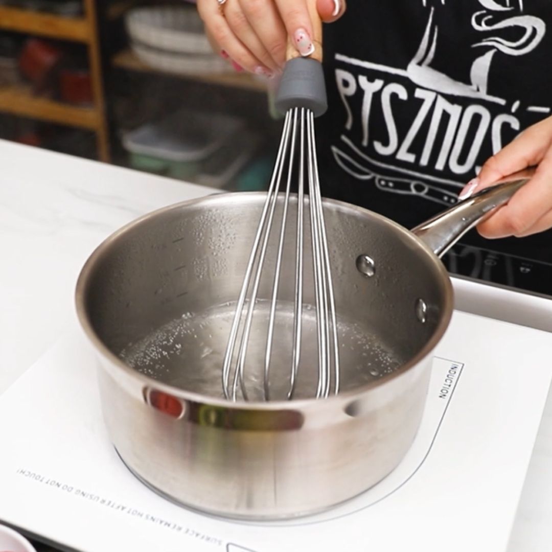 I mix the ingredients in the pot using a kitchen whisk