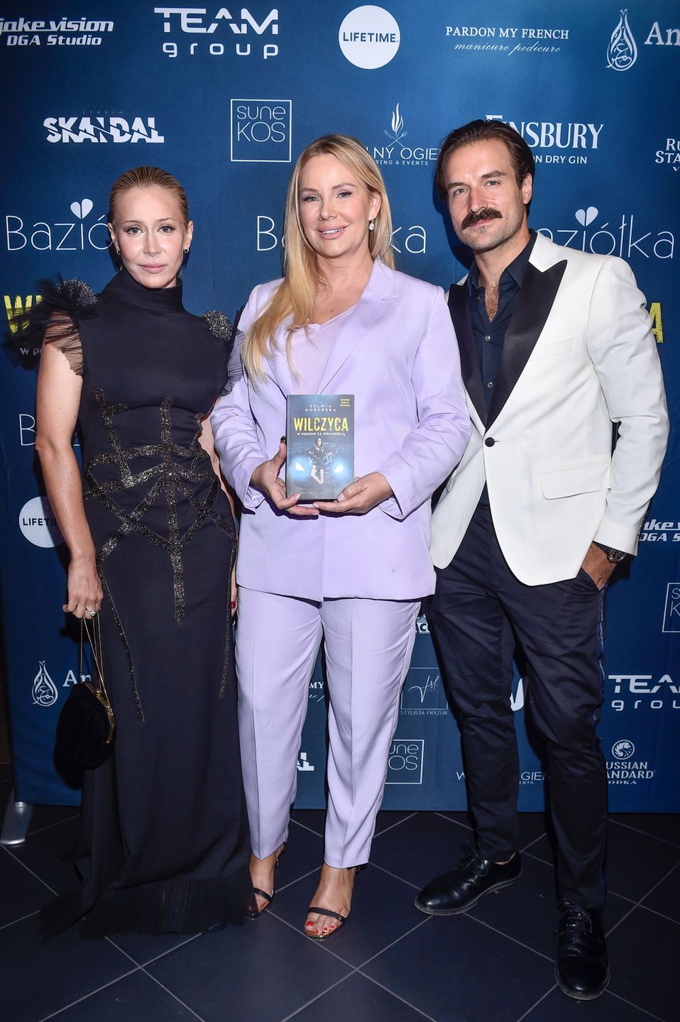 Katarzyna Warnke, Sylwia Koperska i Piotr Stramowski na premierze książki "Wilczyca"