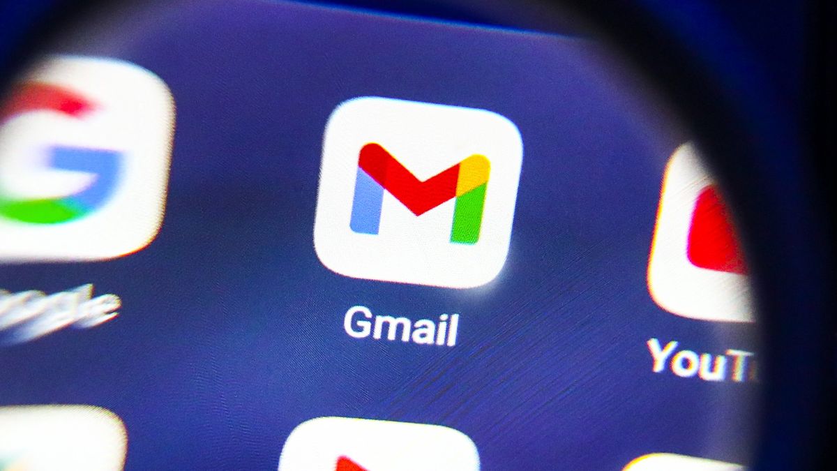 Gmail app is seen through a magnifying glass while being displayed on a mobile phone screen for illustration photo. Gliwice, Poland on January 23, 2022. (Photo by Beata Zawrzel/NurPhoto via Getty Images)