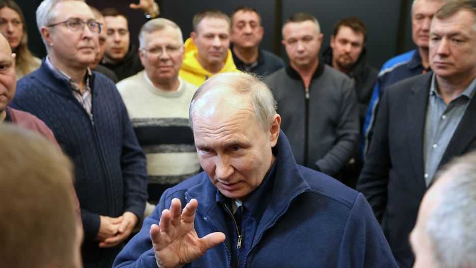 KAZAN, RUSSIA - FEBRUARY 22 (RUSSIA OUT) Russian President Vladimir Putin (C) gestures during his meeting with drivers and road industry representatives at a gas station, February,22,2024, in Kazan, Russia. Putin is having a two days trip to Kazan prior the 2024 Presidential Elections, planned on March (Photo by Contributor/Getty Images)