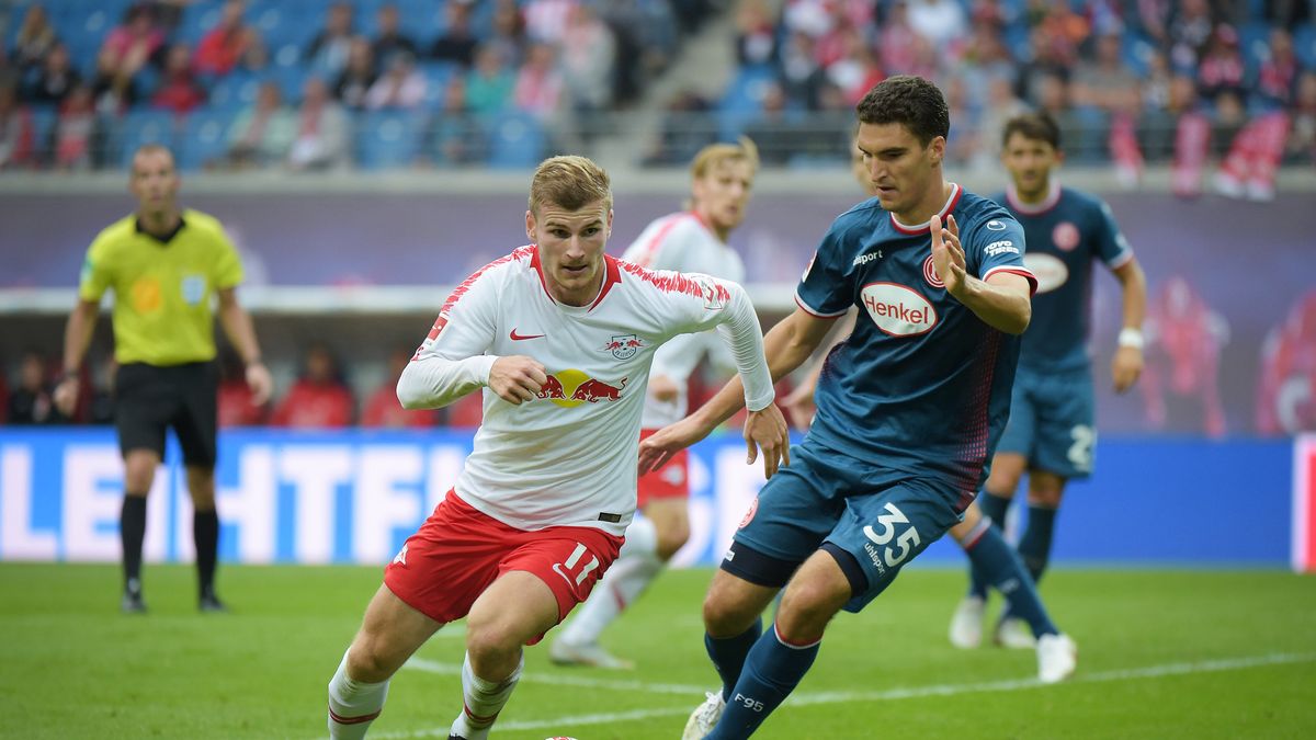 Timo Werner (z lewej) i Marcin Kamiński (z prawej)