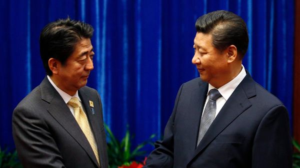 Japoński premier Shinzo Abe i chiński prezydent Xi Jinping