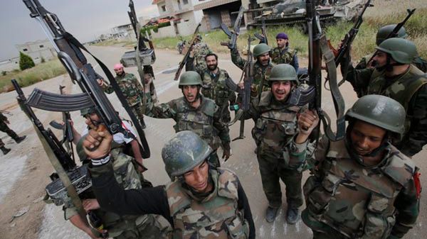 Żołnierze armii rządowej Syrii w Al-Kusajr
