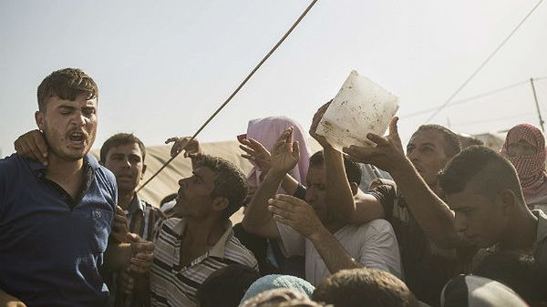 Uchodźcy, którzy musieli opuścić swoje domy w wyniku walk Iraku z Państwem Islamskim. Obóz w Kelek