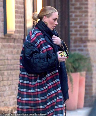 EXCLUSIVE: Adele was spotted making a rare appearance in NYC on Wednesday.   The "Hello" songstress looked glamorous as she stepped out for the evening, wearing a plaid jacket with quilted sleeves, black skinny jeans and gold tipped boots.    Pictured: Adele      World Rights, No Portugal Rights