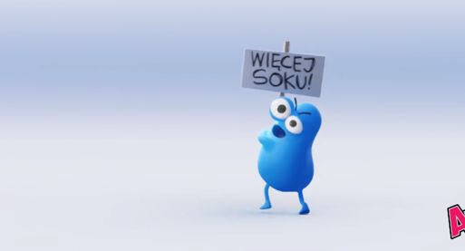 Stworek Akuk reklamuje żelki Akuku!