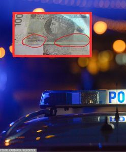 Oszustwo na stacji paliw. Na banknotach było to słowo