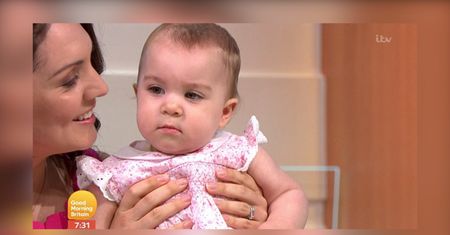 Prognoza pogody z dzieckiem na rękach
