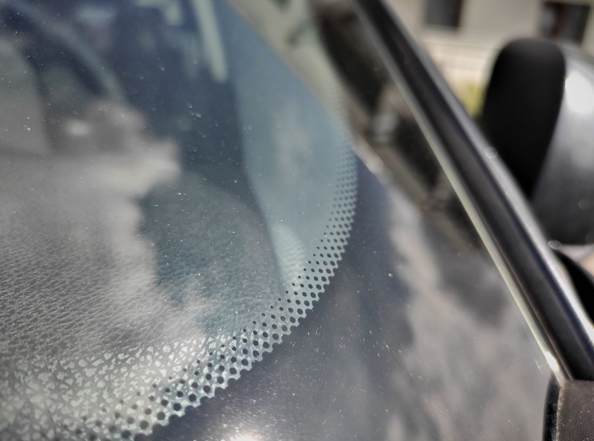 Unveiling the purpose of obscure black dots on car windows