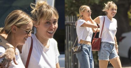 Uśmiechnięta Miley Cyrus eksponuje tatuaże na spacerze z kochanką (FOTO)
