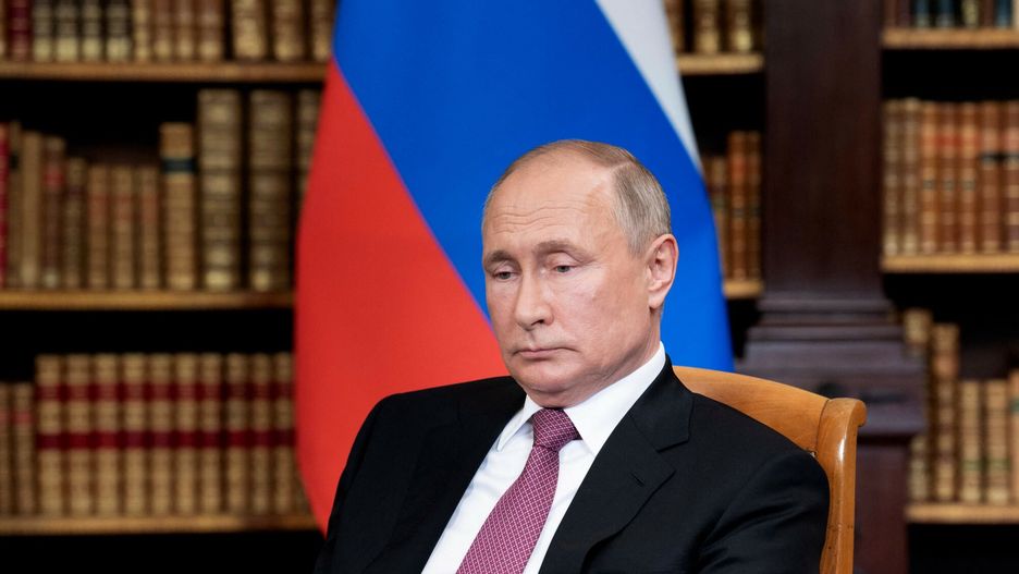 TemporaryRussian President Vladimir Putin looks on as he waits for the US-Russia summit at the Villa La Grange, in Geneva on June 16, 2021. (Photo by Brendan Smialowski / AFP)BRENDAN SMIALOWSKI