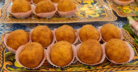 We Włoszech spróbowałam arancini. Zajadałam się nimi przez cały wyjazd