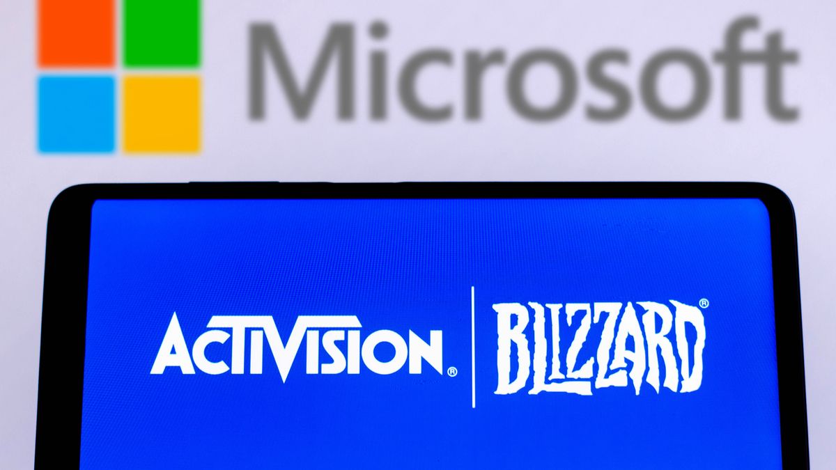 BRAZIL - 2022/02/04: In this photo illustration, Activision Blizzard logo is displayed on a smartphone screen with a Microsoft Corporation logo in the background. (Photo Illustration by Rafael Henrique/SOPA Images/LightRocket via Getty Images)