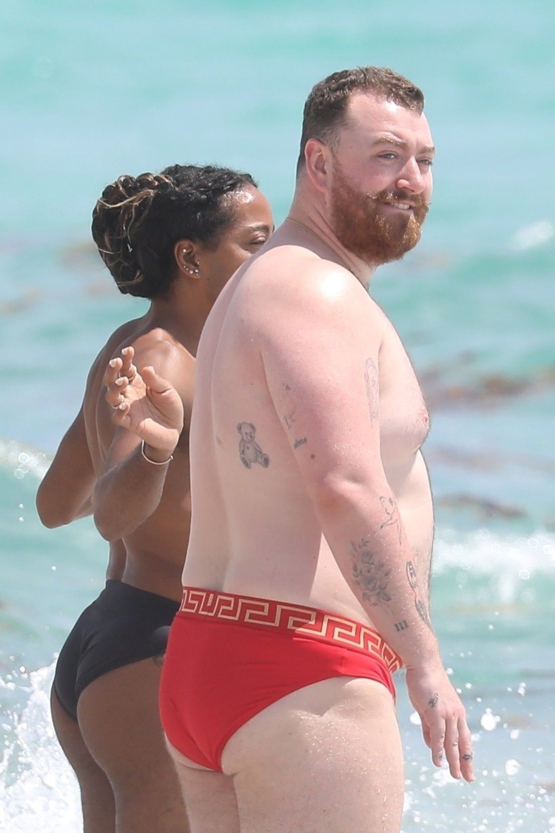 Sam Smith relaxes on the beach. Paparazzi photos