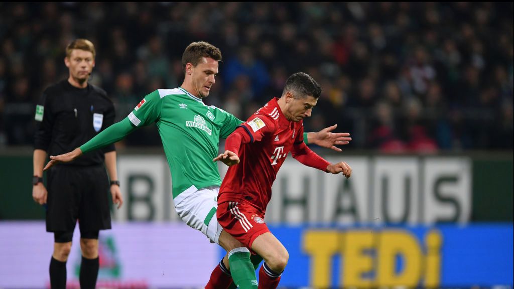 Getty Images / Stuart Franklin/Bongarts / Na zdjęciu: Sebastian Langkamp i Robert Lewandowski