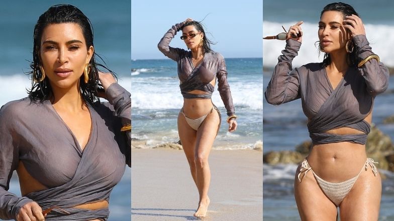 Kim Kardashian przechadza się po plaży
