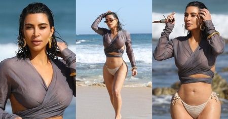 Spragniona uwagi Kim Kardashian prezentuje krągłości, przechadzając się po plaży w Malibu (ZDJĘCIA)