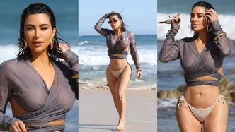 Spragniona uwagi Kim Kardashian prezentuje krągłości, przechadzając się po plaży w Malibu (ZDJĘCIA)