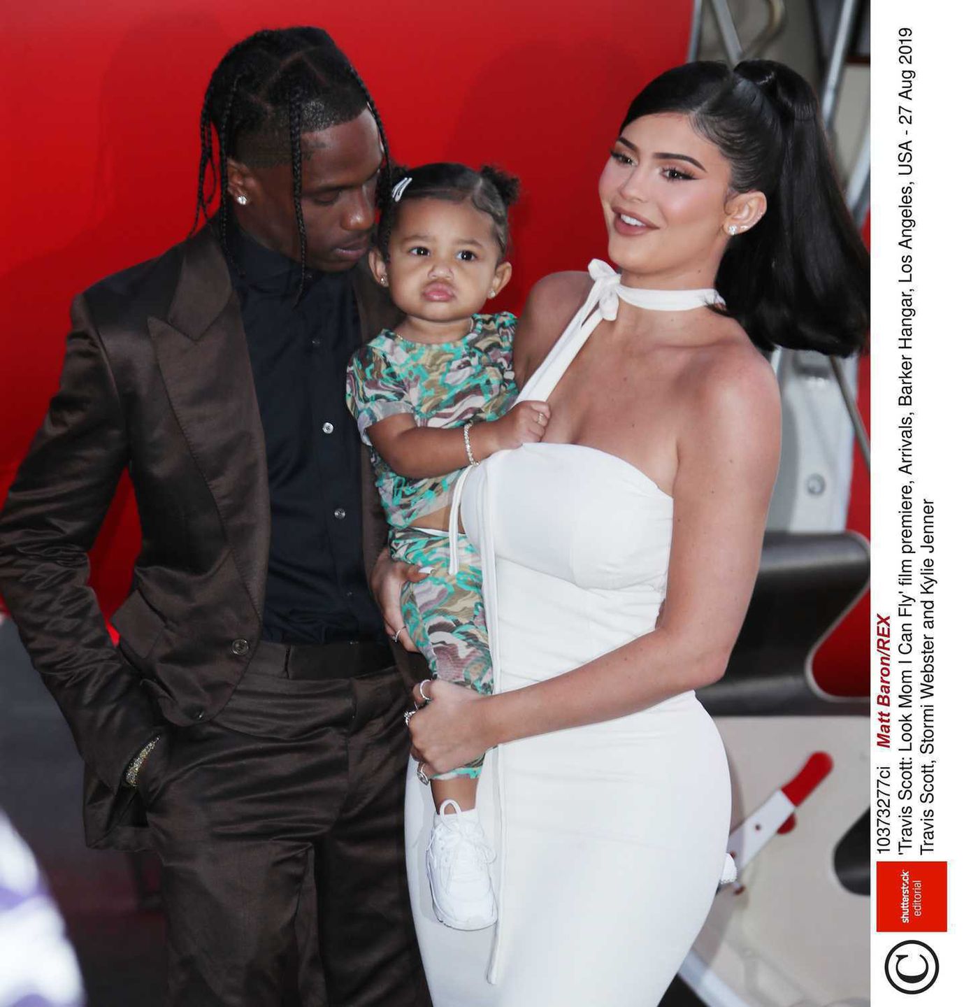 Mandatory Credit: Photo by Matt Baron/REX (10373277ci)  Travis Scott, Stormi Webster and Kylie Jenner  'Travis Scott: Look Mom I Can Fly' film premiere, Arrivals, Barker Hangar, Los Angeles, USA - 27 Aug 2019