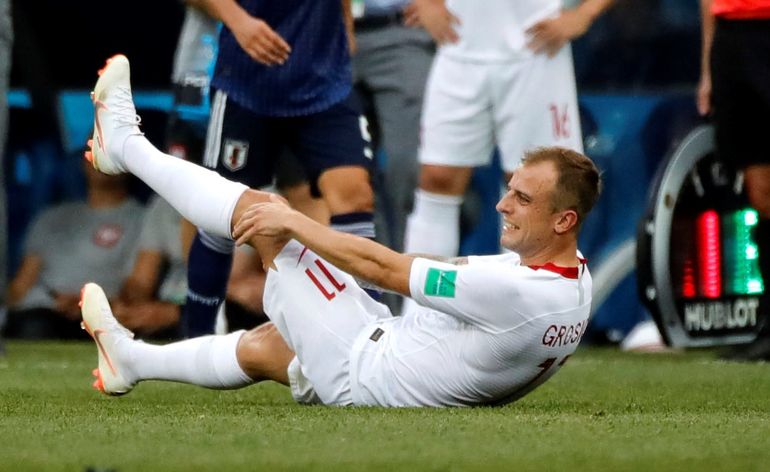 Na zdjęciu: Kamil Grosicki "kontuzjowany" w meczu z Japonią. Fot. Getty Images