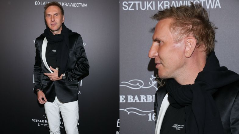 Krzysztof Gojdź pozuje na ściance