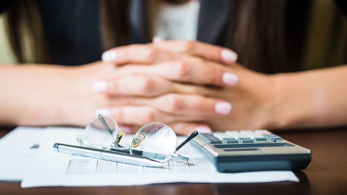 Close up of businesswomans hands with pen, glasses, and calculator doing some financial calculations
Close up of businesswomans hands with pen, glasses, and calculator doing some financial calculations
NoSystem images