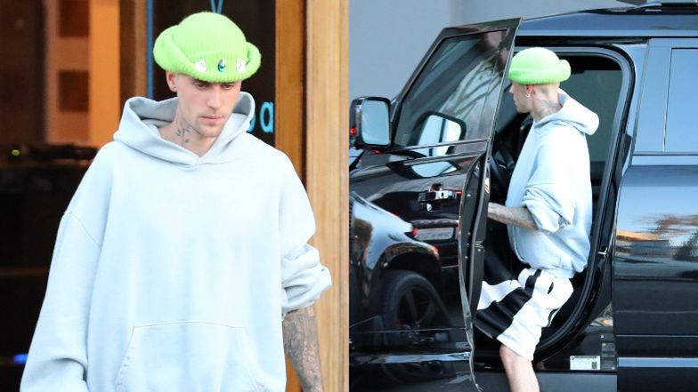 Posępny Justin Bieber w zielonym kapelutku wlecze się do samochodu, wychodząc ze SPA