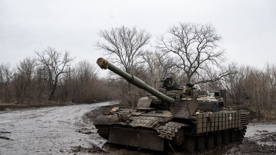 BAKHMUT, UKRAINE - FEBRUARY 13: A T-62 Battle Tank lies idle after being hit by a Russian Lancet drone a few hours earlier in a village outside Bakhmut on February 13, 2024 in Bakhmut, Donbas, Ukraine. The Senate passed a long-awaited foreign aid package for Ukraine and Israel early Tuesday morning, delivering a bipartisan endorsement of the legislation after months of negotiations, dire battlefield warnings and political mudslinging. As the two-year anniversary of Russias full scale invasion approaches, the Ukrainian military is running low on soldiers and ammunition across the frontline. (Photo by Lynsey Addario/Getty Images)