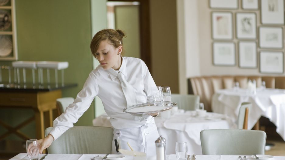 Waitress sets out water glasses in restaurant
Reza Estakhrian
service, organization, preparation