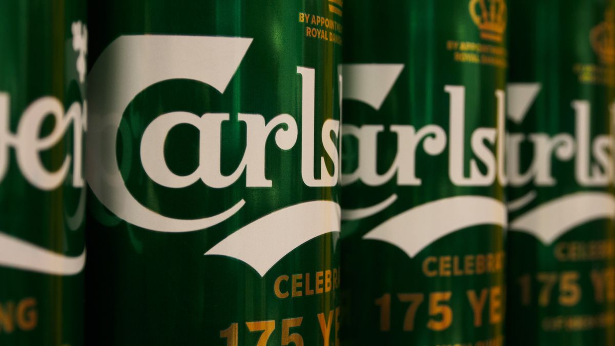 MOSCOW, RUSSIA - 2022/03/31: Carlsberg beer cans seen on a supermarket shelf. It was reported that Carlsberg Group is leaving the Russian market and plans to transfer the local business to a new investor. The Danish brewing company "Carlsberg" is represented in Russia by the brands "Carlsberg", "Kronenbourg", "Holsten" and "Tuborg". (Photo by Alexander Sayganov/SOPA Images/LightRocket via Getty Images)