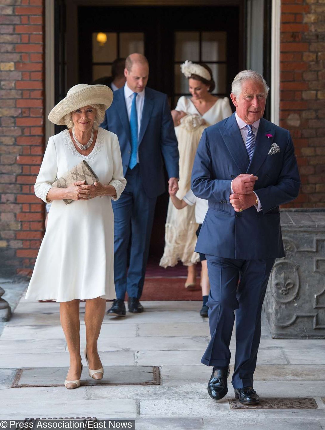 Książę Karol i księżna Camilla podczas chrztu księcia Louisa