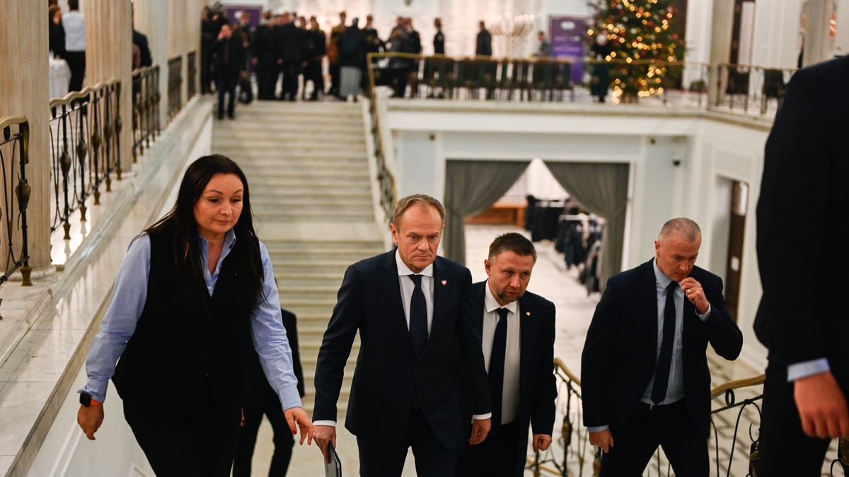 WARSAW, POLAND - DECEMBER 12: The leader of Civic Coalition (KO), Donald Tusk walks side by side with Grzegorz Braun, member of far-right political alliance Confederation used a fire extinguisher to put out the Hanukkah menorah candles at the Parliament (SEJM) on December 12, 2023 in Warsaw, Poland. on December 12, 2023 in Warsaw, Poland. After eight years of Poland's national conservative party in power, centrist Donald Tusk is back and set to forge a pro-EU government. (Photo by Omar Marques/Getty Images)
