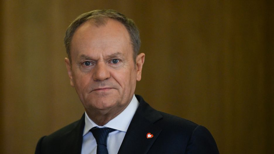 WARSAW, POLAND - DECEMBER 12:
Polish PM Donald Tusk heads to welcome French President Emmanuel Macron at the PM's Office in Warsaw, Poland, on December 12, 2024.
The leaders convened to discuss continued support for Ukraine, current global developments, the future of transatlantic relations, and Poland's priorities for its upcoming EU Council presidency, starting January 1, 2025. (Photo by Artur Widak/NurPhoto via Getty Images)