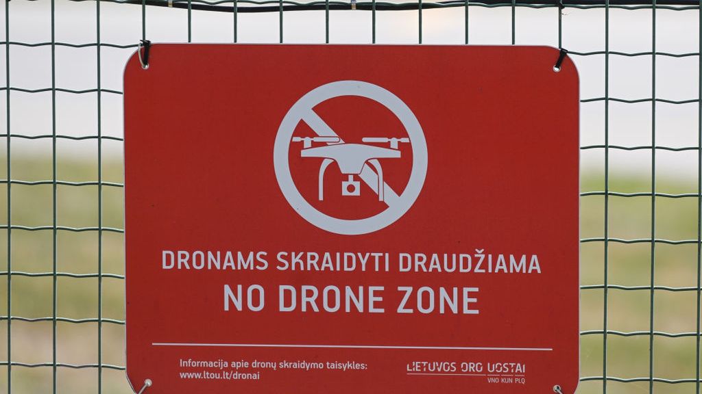 Daily Life In Vilnius
VILNIUS, LITHUANIA - JUNE 12, 2023:   
A sign 'No Drone Zone' seen at the fence of Vilnius airport, on July 12, 2023, in Vilnius, Lithuania. (Photo by Artur Widak/NurPhoto via Getty Images)
NurPhoto
editorial, lithuania nato, nato 2023, vilnius airport, daily life, july 12, no drone zone, artur widaknurphoto