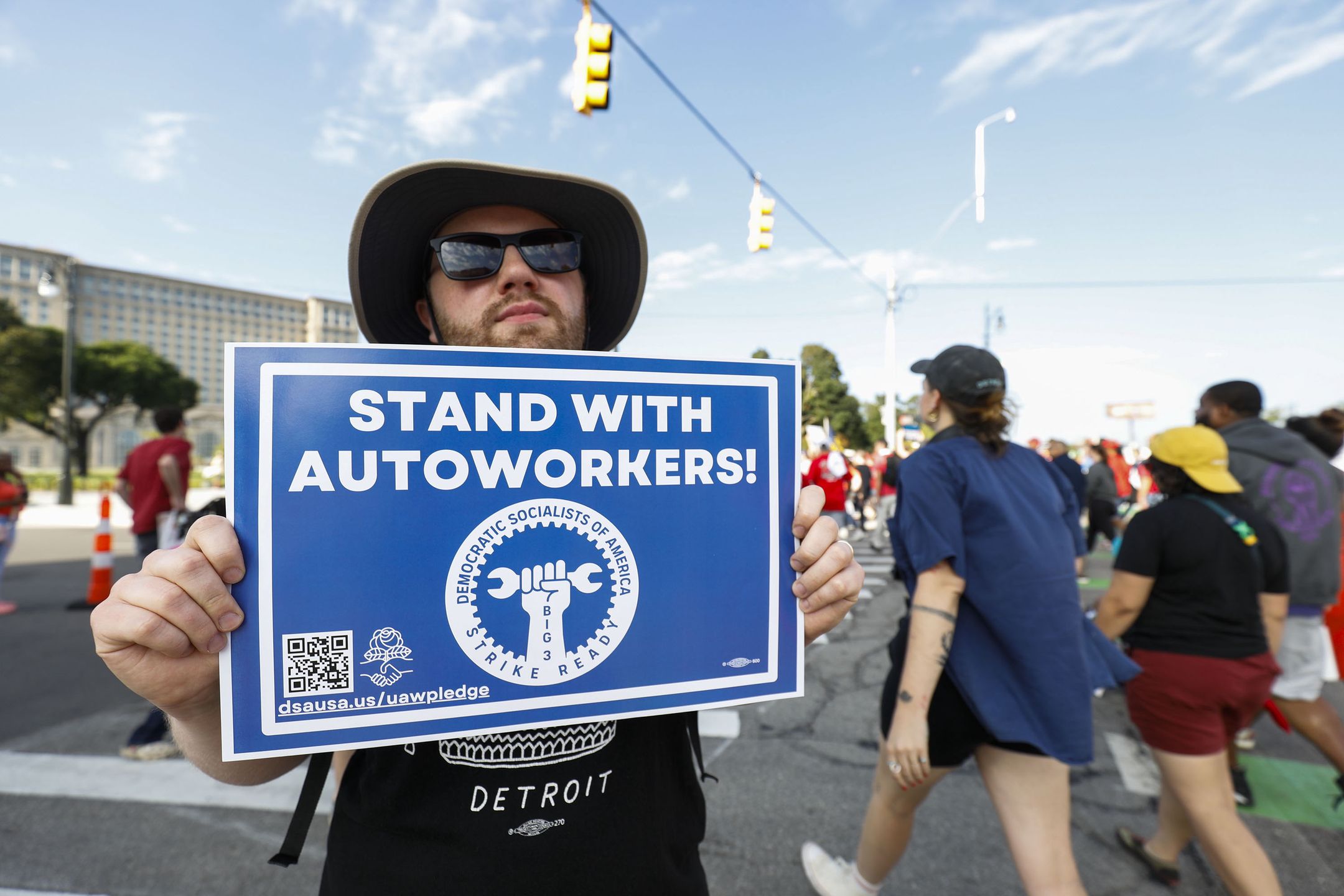DETROIT, MICHIGAN - SEPTEMBER 4: United Auto Workers members and others gather for a rally after marching in the Detroit Labor Day Parade on September 4, 2023 in Detroit, Michigan. The theme of this year's Parade is, "Labor United Stronger Than Ever!". The UAW is currently in contract negotiations with the Big Three automakers Ford, General Motors, and Stellantis, and the current UAW contract expires September 14th. (Photo by Bill Pugliano/Getty Images)
