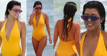 Pośladki Kourtney w żółtym kostiumie na plaży (ZDJĘCIA)