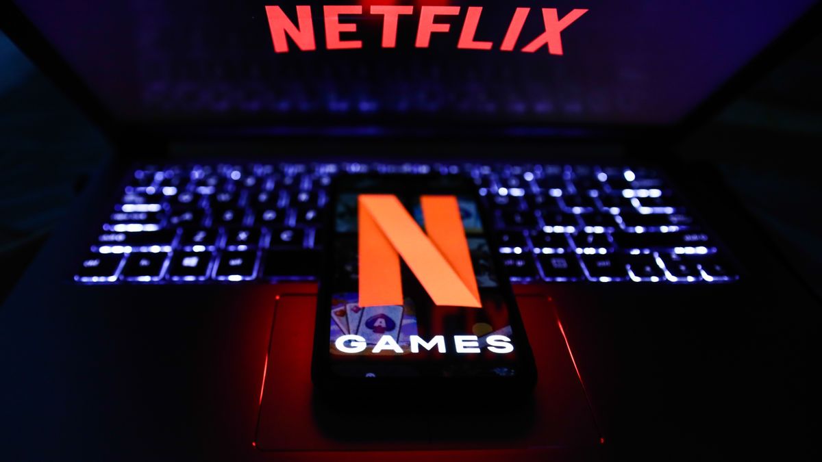 Netflix Games logo displayed on a phone screen and Netflix logo displayed on a laptop screen are seen in this illustration photo taken in Poland on November 4, 2021. (Photo by Jakub Porzycki/NurPhoto via Getty Images)