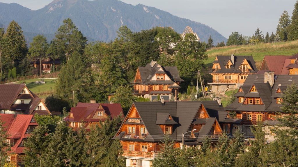 Polish Mountains Village
An aerial landscape of new housing in the Polish town of Koscielisko that is overlooked by the Tatra mountains, on 16th September 2019, near Zakopane, Malopolska, Poland. Local wealth has encouraged tourism apartments and short-stay properties in the Zakopane and Tatra National Park region, a very popular outdoor activity destination for city-dwelling Poles but at the cost of the local environment and landscape. (Photo by Richard Baker / In Pictures via Getty Images)
Richard Baker
malopolska, eu, polish, tatrazansky park narodowy, properties, residential, houses, homes, new housing, holiday homes, vacation homes, rural, countryside, country, view, scenery, hills, mountains, region